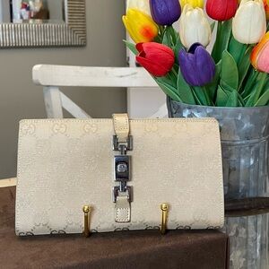 Gucci cream GG canvas wallet with piston clasp